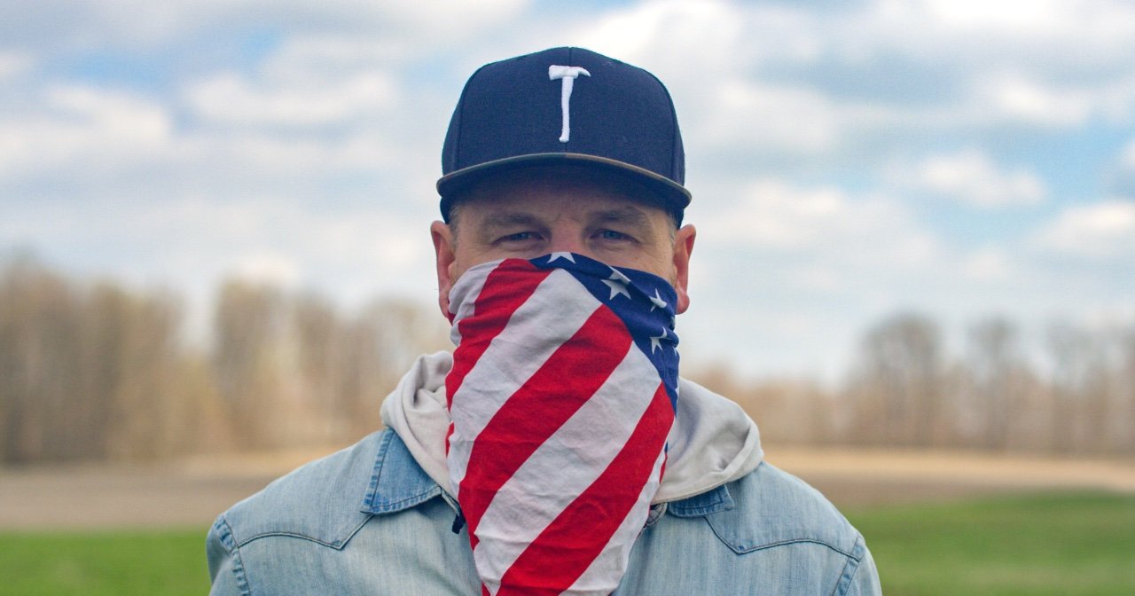 Man with American flag bandana wrapped around his head
